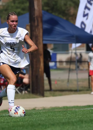 Mallory Herber playing soccer