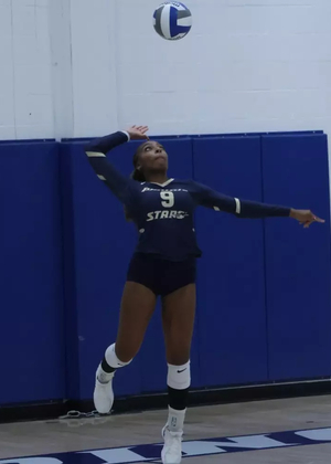 Erica Sledge serving