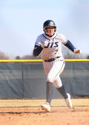 Ella Brinkley running the bases