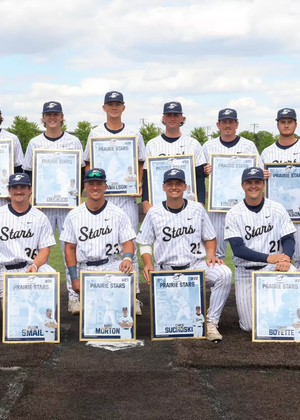 UIS baseball senior class pictured on field in uniform with their senior gifts