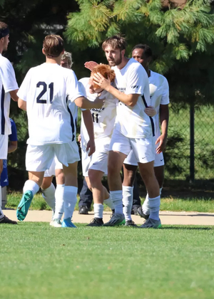 team celebrating a goal