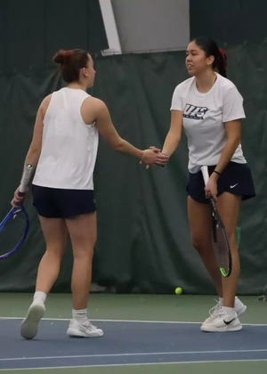 Cristina Mendoza Romero and Jane Carter playing tennis