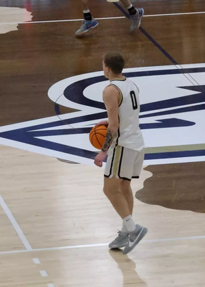 Britt Dutton playing basketball