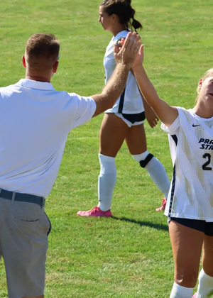 Abby Dellamorte giving Scott Myers a high-five