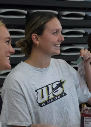 UIS women's soccer atheltes pose for photo during PBJ Springfield event