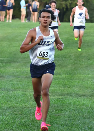Matt Padilla finishing cross country race