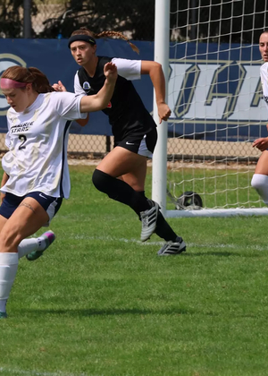 Kalli Drexler kicking soccer ball