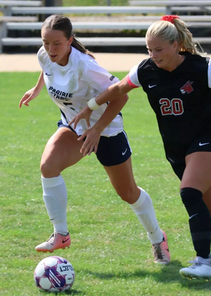 Abbie Gleason playing soccer