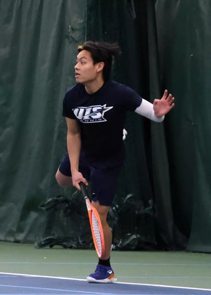 Li En Tan Playing Tennis