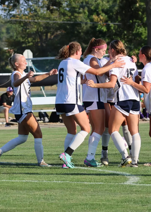 UIS Women's Soccer team celebrates a goal