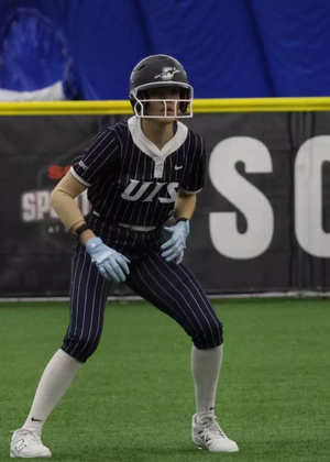 Rosie Bartletti playing softball