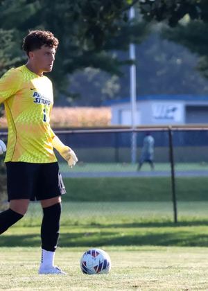 Kevin Kardel goalkeeping in yellow UIS jersey at Kiwanis Stadium