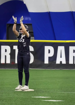 Calista Stahlhut celebrates on second base