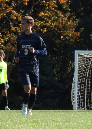 Adam Knaze playing soccer