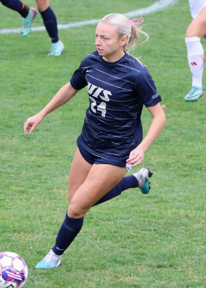 Maggie Joos playing soccer