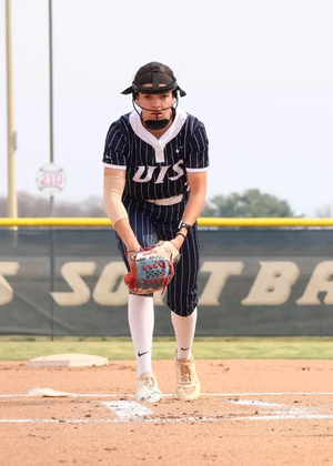 Rosie Bartletti in the circle in blue UIS uniform