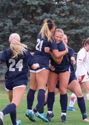 Women's Soccer celebrating a goal
