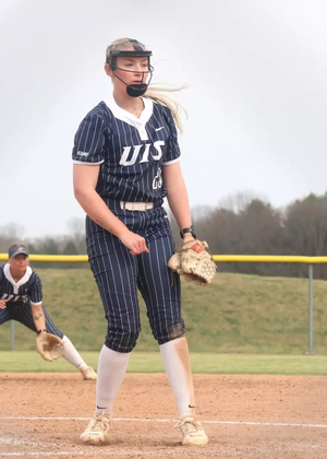 Calista Stahlhut  pitching in blue UIS uniform