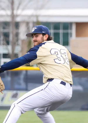 Derek Huber pitching in golf UIS uniform
