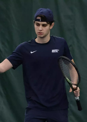 Jorge Roman during doubles match