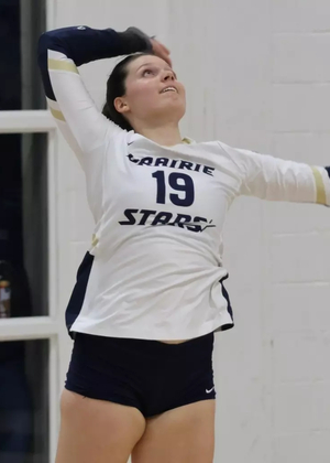 Makenna Cox serving