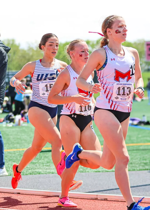 Kaleigh Inniss running outdoor track