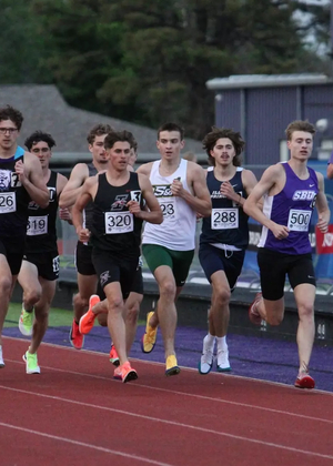 Chase Cooley in a pack of runners in 1500 meter outdoor track race