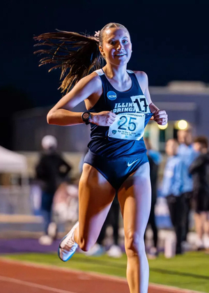 Madelyn Miller-Ross crosses finish line at track meet