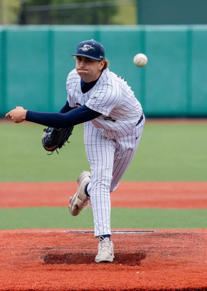 Graham Kasey pitching in GLVC baseball tournament