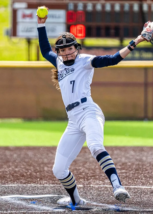 Rosie Bartletti pitching in white uniform in GLVC Tournament