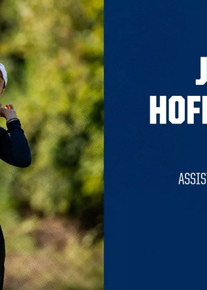 Julie Hofmanova UIS Golf assistant coach. A photo of Hofmanova high-fiving a player taken by Jacob Walton (Maryville)