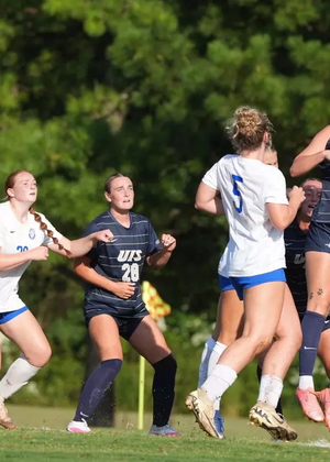 Kalli Drexler heading a soccer ball