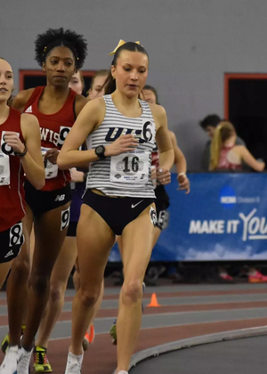 Maddie Miller racing indoor track