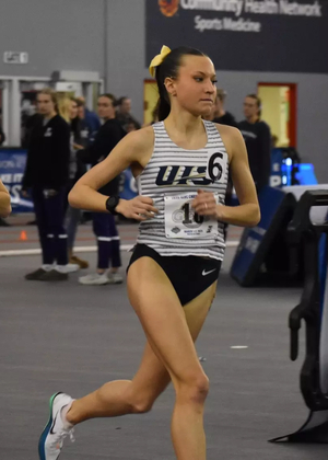 Maddie Miller racing indoor track