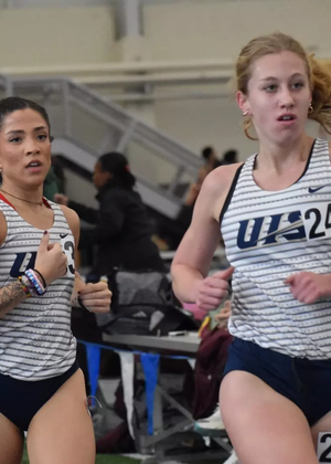 Jordan Serrano and Kaleigh Inniss racing indoor track
