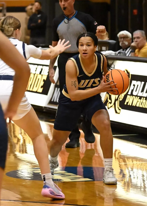 Kayla Rice playing basketball