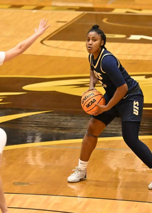 Tatianna McLaren playing basketball