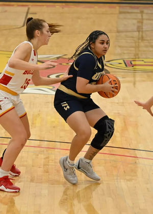 Amaya Asher playing basketball