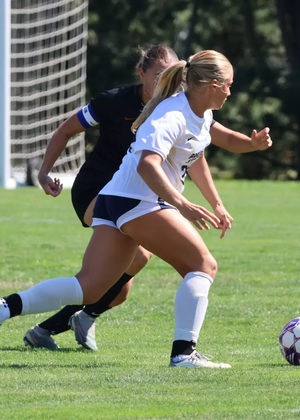 Emily Tully playing soccer