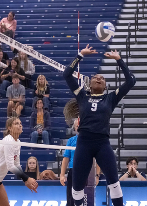 Erica Sledge playing volleyball as setter