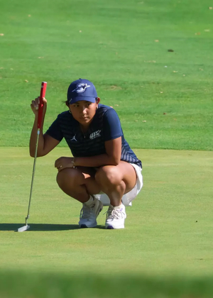Fizreen Ahmadfadzir prepares to putt