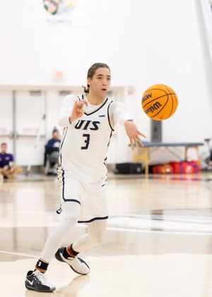 Adidas Davis playing basketball at UIS