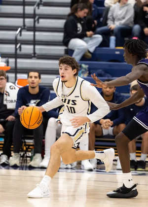 Isaiah Davis playing basketball 