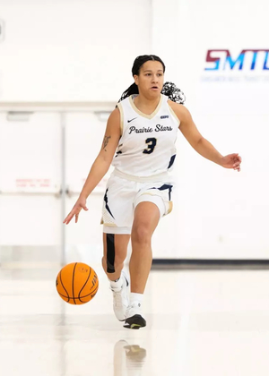 Kayla Rice playing basketball at UIS