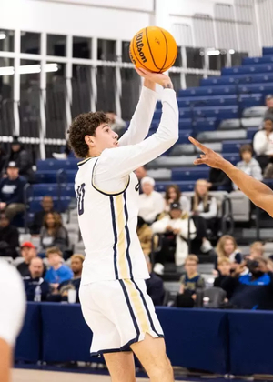 Isaiah Davis shooting a three-point shot