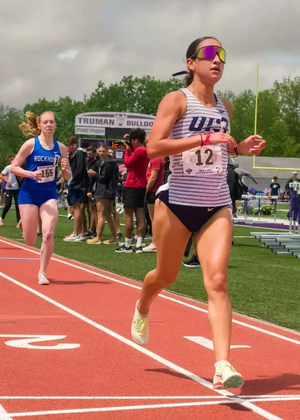 Lillian Buzani racing to finish line