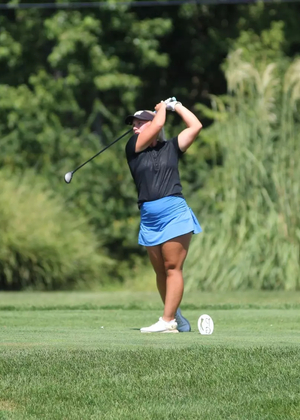 Gracie Russell golfing