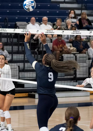 Erica Sledge setting in volleyball match 