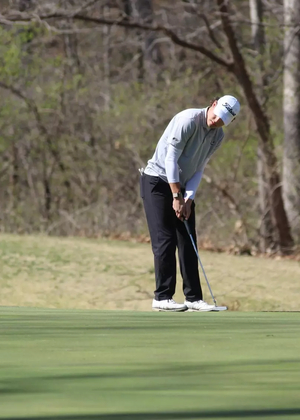 Julien Babineau golfing