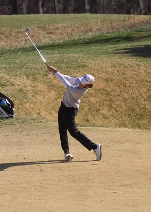 Julien Babineau using an iron